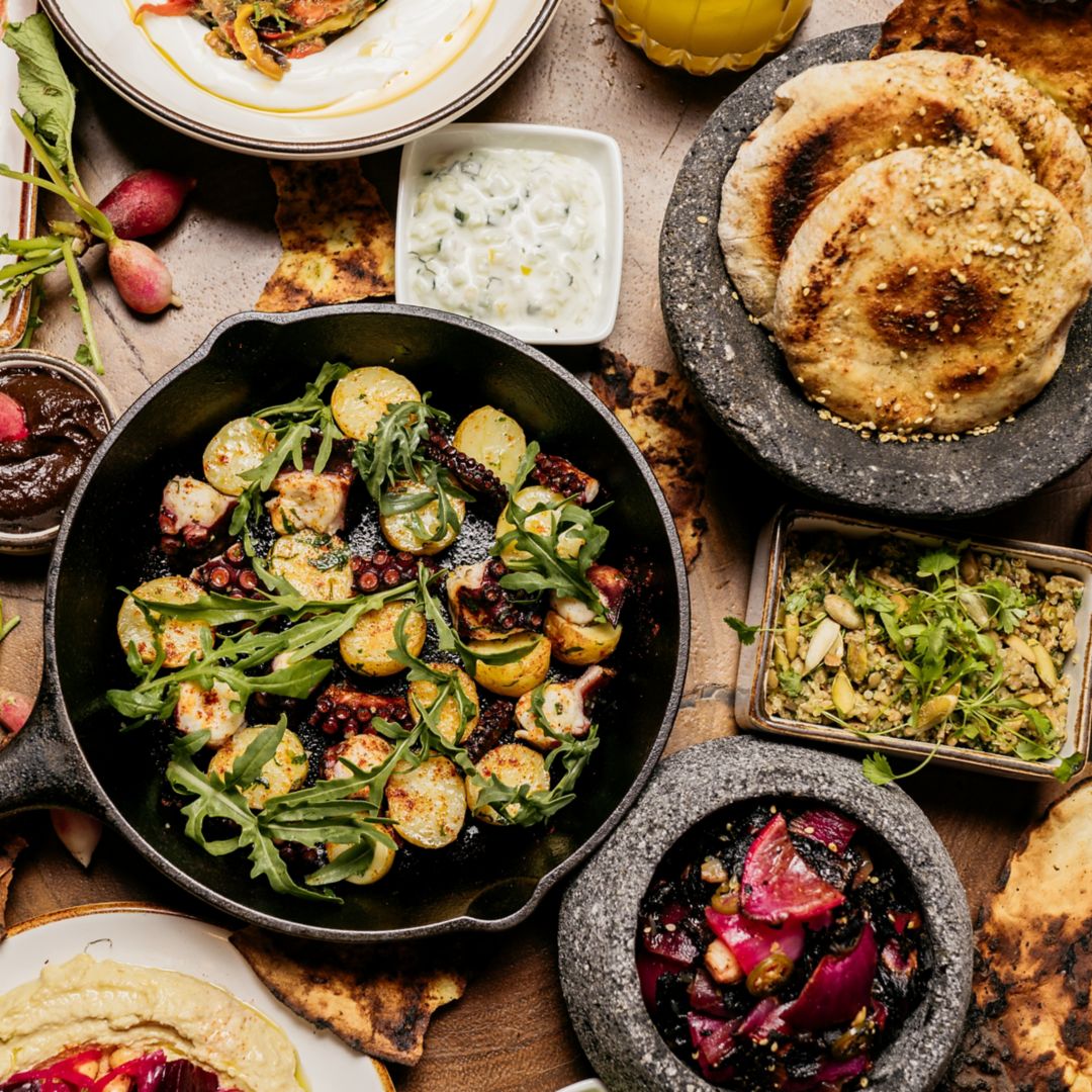 Zapote Bar_Aerial Shot of a variety of colorful dishes, plates and beverages served to share